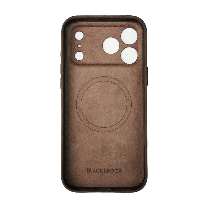 The BlackBrook Case Ryker Distressed Coffee full-grain leather iPhone 17 Pro Max MagSafe case covers the entire camera plateau.